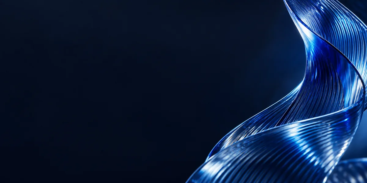 A ribbon of cobalt glass curving up through a dark field